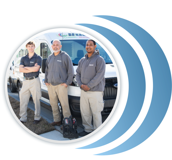 Company photo of three techs in front of van